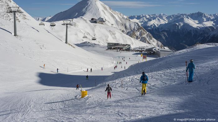 People skiing down the slopes of the winter resort of Silvretta Arena, Ischgl, Austria