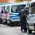 German police officers in Berlin standing in front of police vans