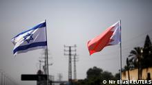 FILE PHOTO: The flags of Israel and Bahrain flutter along a road in Netanya, Israel September 14, 2020. REUTERS/Nir Elias/File Photo