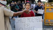 Junge Klimaaktivistin | Licypriya Kangujam mit Plakat
