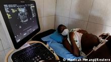 Secondary school student Jackline Bosibori, 17, who is pregnant, attends an ultrasound appointment at Tabitha Medical Clinic within the Kibera slums in Nairobi, Kenya, October 2, 2020. I don't want to get married at this stage, I am still very young and have dreams to fulfil, said Bosibori who wants to become a lawyer. REUTERS/Monicah Mwangi SEARCH KENYA LOCKDOWN PREGNANCIES FOR THIS STORY. SEARCH WIDER IMAGE FOR ALL STORIES.