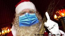 FOTOMONTAGE-Weihnachten 2020 mitten in der Coronavirus Pandemie.
Wie weiter mit dem Teil-Lockdown?
Lockerungen an Weihnachten wohl nur bei deutlich sinkenden Corona-Zahlen.
Weihnachtsmann traegt Mundschutz,Maske, | Verwendung weltweit