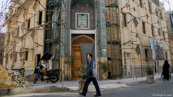 man walking in Hasan Abad