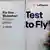 A Lufthansa airport sign advertises pre-flight testing