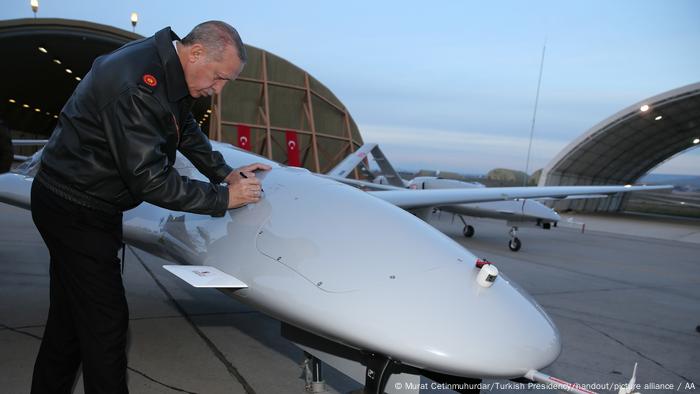 Turkish President Recep Tayyip Erdogan signs a Bayraktar TB2 drone