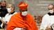 Wilton Gregory wearing a face mask with his new cardinal robes Wilton Gregory wearing a face mask with his new cardinal robes