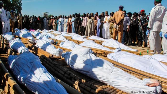 Mourners attend the funeral of 43 farm workers in Zabarmari, about 20km from Maiduguri, Nigeria, on November 29, 2020 