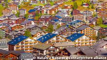 Zermatt, Switzerland town aerial view in famous swiss ski resort, colorful traditional houses
