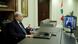 Michel Aoun looking at screen Michel Aoun looking at screen