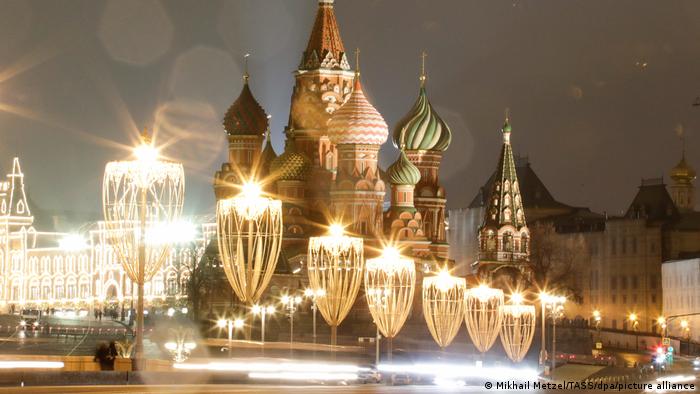 Festively illuminated Saint Basil's Cathedral with its typical onion domes, Moscow, Russia