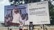 Eine Frau vor einem Plakat von Nana Akufo-Addo Eine Frau vor einem Plakat von Nana Akufo-Addo