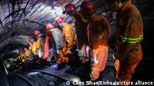 (201203) -- LEIYANG, Dec. 3, 2020 (Xinhua) -- Rescue workers enter the flooded coal mine shaft in Leiyang, central China's Hunan Province, Dec. 3, 2020. Dozens of rescue workers entered a flooded coal mine shaft in central China's Hunan Province Thursday to search for 13 trapped miners. The new-stage rescue came after four days of pumping water out of the flooded Yuanjiangshan coal mine in the city of Leiyang, creating space for the rescue workers to launch the underground rescue operation, according to the local rescue headquarters. (Xinhua/Chen Sihan)