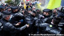 Protesters are blocked by riot police officers during a demonstration Saturday, Dec. 5, 2020 in Paris. Police misconduct has received additional attention as a cause in France after footage emerged last month of French police officers beating up a Black man, triggering a nationwide outcry. (AP Photo/Francois Mori)