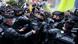 Protesters are blocked by riot police officers during a demonstration in Paris, France Protesters are blocked by riot police officers during a demonstration in Paris, France