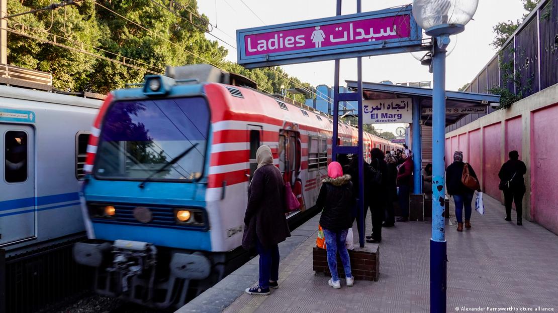 Pedestrians on the platform of the El Malek El Saleh station on the Cairo metro waiting in the ladies-only section