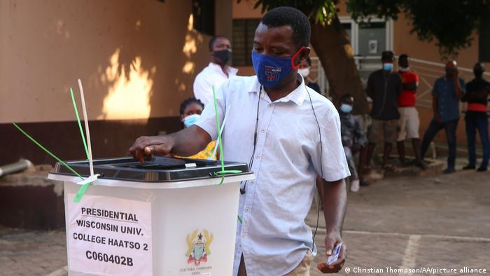 A man casts his vote at Wisconsin University polling station in Accra