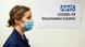 A nurse passes a sign indicating a Covid-19 Vaccination Centre at the Royal Free Hospital in London A nurse passes a sign indicating a Covid-19 Vaccination Centre at the Royal Free Hospital in London
