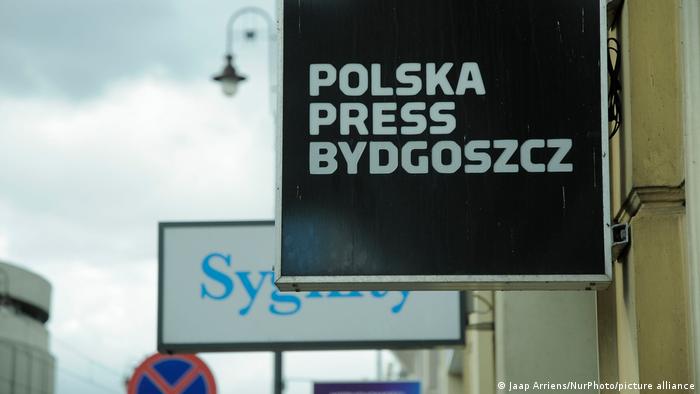 The Polska Press logo on a sign in Bydgoszcz 