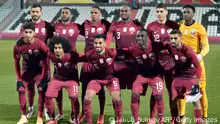 Qatar's national football team, (front row, LtoR) Qatar's midfielder Mohammed Waad Abdulwahab, Qatar's forward Akram Afif, Qatar's defender Tarek Salman, Qatar's forward Almoez Ali, Qatar's forward Hassan Al-Haydos, and (back row, LtoR) Qatar's midfielder Boualem Khoukhi, Qatar's midfielder Abdulaziz Hatem, Qatar's defender Pedro Miguel Correia, Qatar's defender Abdelkarim Hassan, Qatar's midfielder Karim Boudiaf and Qatar's goalkeeper Meshaal Barsham pose for a team photo ahead of the international friendly football match between Costa Rica and Qatar at the Bundesstadion Suedstadt (BSFZ-Arena) in Maria Enzersdorf, Austria, on November 13, 2020. (Photo by JAKUB SUKUP / AFP) (Photo by JAKUB SUKUP/AFP via Getty Images)