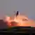 SpaceX's first super heavy-lift Starship SN8 rocket explodes during a return-landing attempt 