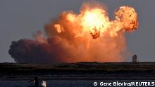 SpaceX's first super heavy-lift Starship SN8 rocket explodes during a return-landing attempt after it launched from their facility on a test flight in Boca Chica, Texas U.S. December 9, 2020. REUTERS/Gene Blevins