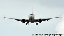 A Boeing 737 MAX of Brazilian airline Gol lands at Salgado Filho airport in Porto Alegre, Brazil on December 9, 2020. - More than 20 months after it was grounded following two deadly crashes, Boeing's 737 MAX returned to the skies Wednesday with an incident-free commercial flight in Brazil, said AFP journalists on board. Low-cost airline Gol's Flight 4104 from Sao Paulo arrived safely in the southern city of Porto Alegre about 70 minutes after take-off using the revamped jet, in a first that Boeing hopes will turn the page on a badly damaging crisis in the wake of the twin crashes. (Photo by SILVIO AVILA / AFP) (Photo by SILVIO AVILA/AFP via Getty Images)