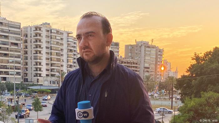 Bassel Aridi, DW correspondent reporting from Beirut at sunset