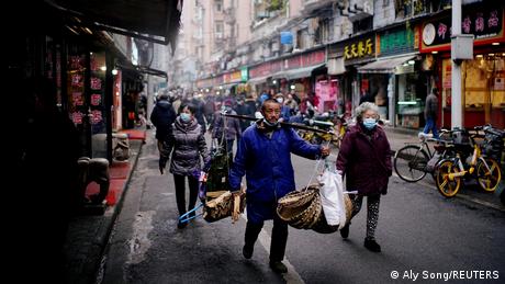 People wearing masks in Wuhan street