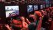 Players try out a Formula 1 game at the Gamescom computer games fair in Cologne. Archive image from August 2018. Players try out a Formula 1 game at the Gamescom computer games fair in Cologne. Archive image from August 2018.