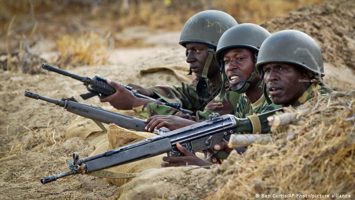 Kenyan soldiers armed with rifles