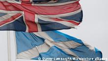 Scottish independence referendum. File photo dated 21/8/2014 of a Union Flag and Saltire Flag. Legal advice commissioned by a pro-independence group has suggested there are good arguments to be made for holding a second referendum without UK Government approval. Issue date: Thursday January 16, 2020. Forward As One had set up a crowdfunder to instruct counsel to explore a possible legal challenge to Boris Johnson's refusal of a Section 30 request by the Scottish Government to stage a vote. See PA story POLITICS Scotland. Photo credit should read: Danny Lawson/PA Wire URN:49618359