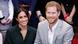 Prince Harry and his wife Meghan sit next to each other Prince Harry and his wife Meghan sit next to each other