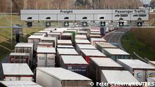 18.12.2020
Lorries queue on the M20 motorway to enter the Eurotunnel terminal in Folkestone, Britain, December 18, 2020. REUTERS/Peter Cziborra