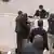 Imagem das câmeras da Alesp mostra deputado Fernando Cury apalpando a deputada Isa Penna, em volta de outros parlamentares estaduais