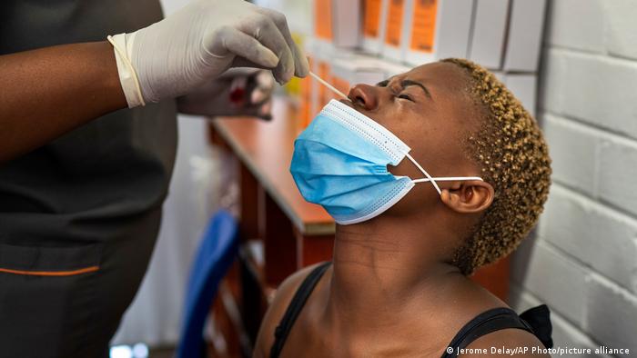 A woman in South Africa getting tested for COVID-19 before receiving a second vaccine shot