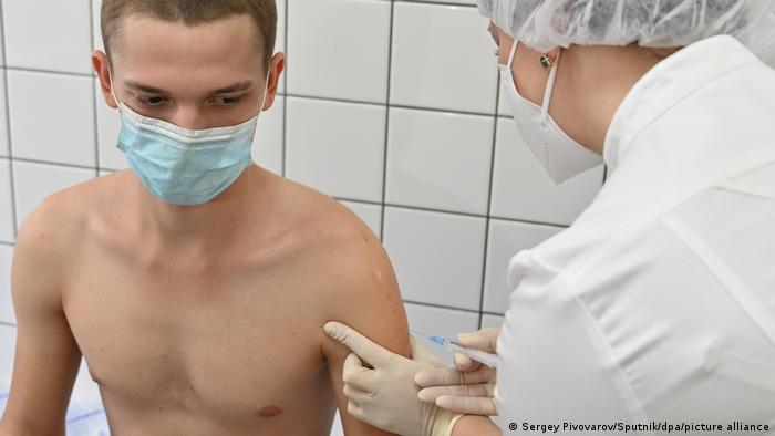 A medical worker injects the Gam-COVID-VAK (trademark Sputnik V) coronavirus vaccine in military clinical hospital No. 1602 in Rostov-on-Don, Russia.