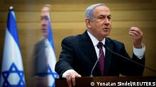 FILE PHOTO: Israeli Prime Minister Benjamin Netanyahu delivers a statement to Likud party MKs at the Knesset (Israel's parliament) in Jerusalem, December 2, 2020. Yonatan Sindel/Pool via REUTERS/File Photo