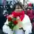Российский политик Юлия Галямина с букетом роз у выхода из здания суда в Москве