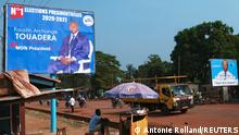 A campaign billboard of Central African Republic President Faustin Archange Touadera is seen the streets ahead of the upcoming elections in Bangui, Central African Republic December 26, 2020. REUTERS/Antonie Rolland NO RESALES. NO ARCHIVES