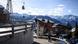 A skiers walk under a ski lift in the Alpine resort of Verbier A skiers walk under a ski lift in the Alpine resort of Verbier
