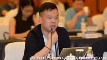 ©/MAXPPP - CHENGDU, CHINA - MAY 25: Lin Qi, Chairman and CEO of Yoozoo Games Co., Ltd, speaks during a meeting on May 25, 2018 in Chengdu, Sichuan Province of China. (Photo by Zhang Zhi/Red Star News/VCG)