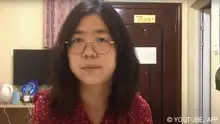 This screengrab taken on December 28, 2020 from an undated video showing former Chinese lawyer and citizen journalist Zhang Zhan as she broadcasts via YouTube, at an unconfirmed location in China. - Zhang was jailed for four years on December 28, 2020 by a court in Shanghai for her reporting from Wuhan as the Covid-19 outbreak unfurled, her lawyer said, almost a year after details of an unknown viral pneumonia surfaced in the central China city. (Photo by Handout / YOUTUBE / AFP) / -----EDITORS NOTE --- RESTRICTED TO EDITORIAL USE - MANDATORY CREDIT AFP PHOTO / YouTube - NO MARKETING - NO ADVERTISING CAMPAIGNS - DISTRIBUTED AS A SERVICE TO CLIENTS - NO ARCHIVES