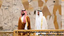 In this Wednesday, Nov. 27, 2019, photo released by Ministry of Presidential Affairs, Saudi Crown Prince Mohammed bin Salman, left, attends a ceremony with Abu Dhabi Crown Prince Mohammed bin Zayed Al Nahyan at Qasr Al Watan in Abu Dhabi, United Arab Emirates. Saudi crown prince is in the United Arab Emirates for talks that are expected to focus on the war in Yemen and tensions with Iran. (Mohamed Al Hammadi/Ministry of Presidential Affairs via AP)