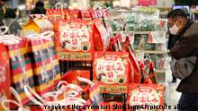 26.12.2020 Fukubukuro lucky bags are displayed at a shopping mall, AEON MALL in Higashikurume, Tokyo on Dec. 25, 2020. Usually Fukubukuro are released during New Year Season, however, to avoid infections of Coronavirus COVID-19, the store started starts to sell partly onthe same day.( The Yomiuri Shimbun via AP Images )