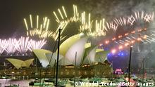 SYDNEY, AUSTRALIA - JANUARY 01: A fireworks display over the Sydney Opera House during New Year's Eve celebrations on January 01, 2021 in Sydney, Australia. Celebrations look different this year as COVID-19 restrictions remain in place due to the ongoing coronavirus pandemic. (Photo by Wendell Teodoro/Getty Images)