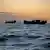 Mittelmeer Libyen | NGO Open Arms hilft Migranten im Holzboot 