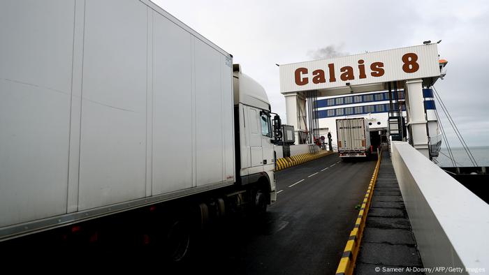 Trucks driving onto a ferry in Calais