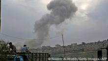March 18, 2018***
TOPSHOT - Smoke billows following the explosion in the northwestern Syrian city of Afrin after Syrian-Arab Turkish backed fighters took control of the city from the Kurdish People's Protection Units (YPG) on March 18, 2018.
In a major victory for Ankara's two-month operation against the YPG in northern Syria, Turkish-led forces pushed into Afrin apparently unopposed, taking up positions across the city. / AFP PHOTO / Nazeer al-Khatib (Photo credit should read NAZEER AL-KHATIB/AFP via Getty Images)