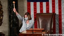U.S. Speaker of the House Nancy Pelosi wields the Speaker's gavel after being re-elected as Speaker and preparing to swear in members of the 117th House of Representatives in Washington, U.S., January 3, 2021. REUTERS/Erin Scott/Pool