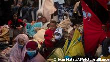 Migrants from Eritrea, Egypt, Syria and Sudan, rest on board the Spanish NGO Open Arms vessel after having been rescued in the Mediterranean sea, about 110 miles north of Libya, on Saturday, Jan. 2, 2021. (AP Photo/Joan Mateu)